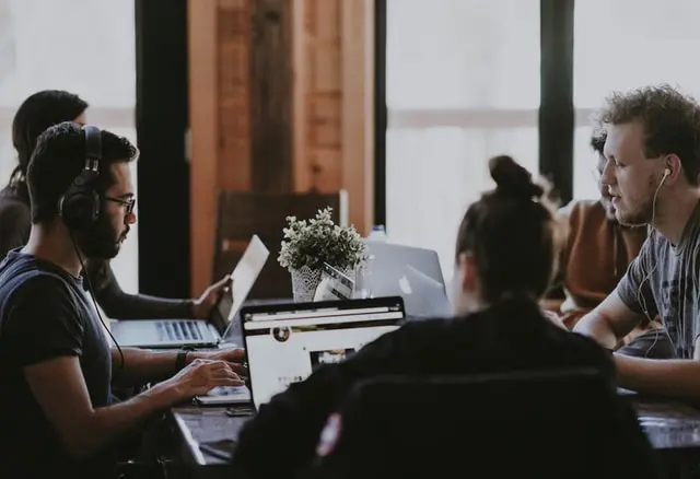 Team collaborating on a project in a modern office